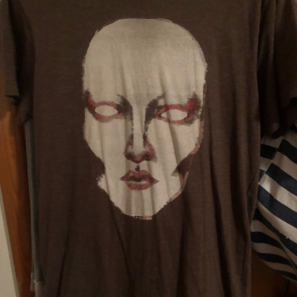 Unique face T-shirt.